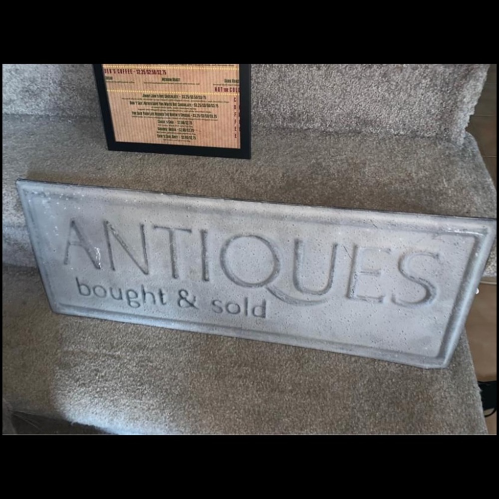 Metal antiques sign